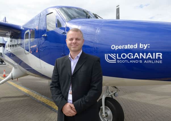 Picture by Nick Ponty  5/8/16
Loganair new branding  on ''Spirit of Glasgow'' aircraft at Glasgow Airport.