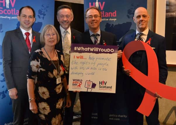 Pictured is MSP Alasdair with HIV Scotland, CEO, George Valiotis, and community activists, Cathy Crawford, Will Dalgleish and Stephen Duffy.