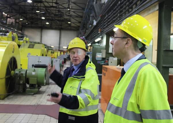 Donald Mackenzie, Western Isles Generation Manager at SSEN (left) and Alasdair Allan MSP (right) on a tour of the Battery Point Power Station, Stornoway.