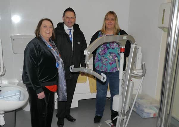 The new equipment for Hillcrest includes a hoist system with Emelin Collier, NHSWI Head of Planning & Development, Gordon Jamieson, NHSWI Chief Executive, and Valerie Russell, Action for Children Eilean Siars Childrens Service Manager.