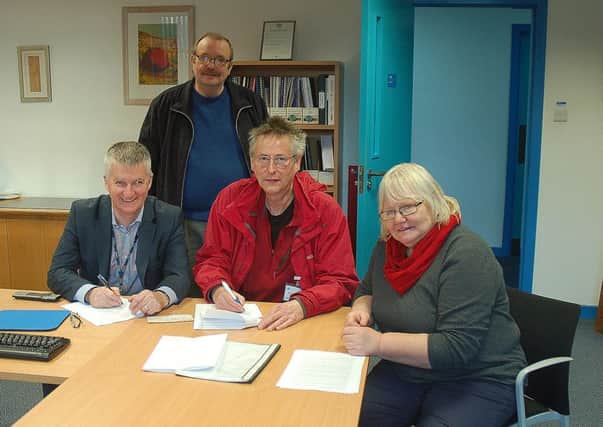 Pictured are Iain Macmillan, Principal Lews Castle College/UHI, Matt Bruce, Chairman Lewis and Harris Horticultural Producers and Barbara Ziehm and Angus Murray sign the lease of College land to the LHHP.