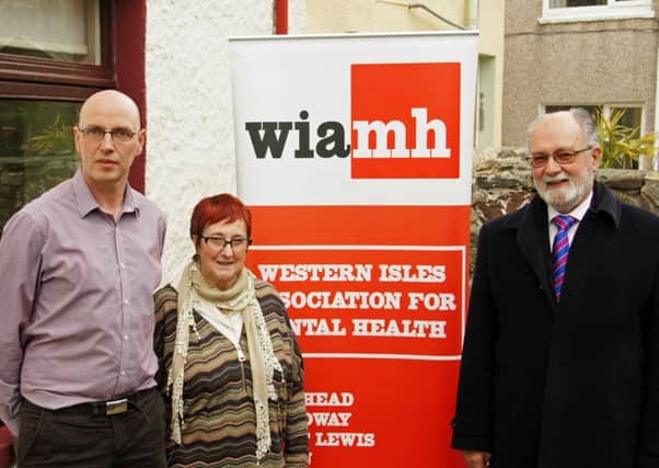 Point and Sandwick Trust chair Angus McCormack, right, with Del Gunn, Western Isles Association for Mental Health manager, and Cathy MacArthur, WIAMH chair.