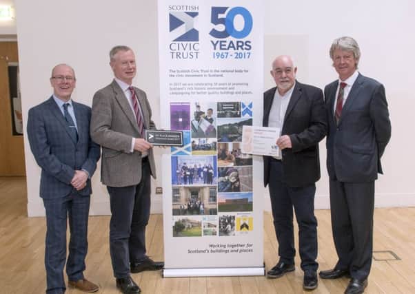 Pictured are MSP Kevin Stewart (Minister for Local Government and Housing), Ron MacEachran, John Coleman (Architect) and Colin Mclean, Chair of the Civic Trust.