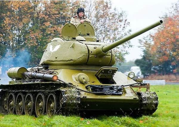 The tank is from the "13th Guards Poltavaskaya" which is a Soviet Red Army living history group. They will be in attendance at Poolewe.