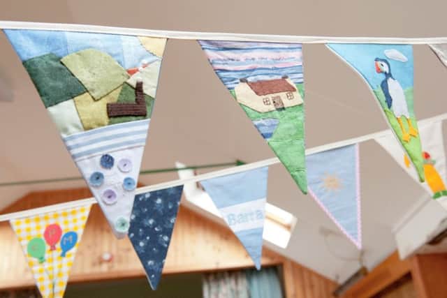 On display will be the Barra Bunting, a chain of textile flags made by over 200 residents and visitors to Barra.