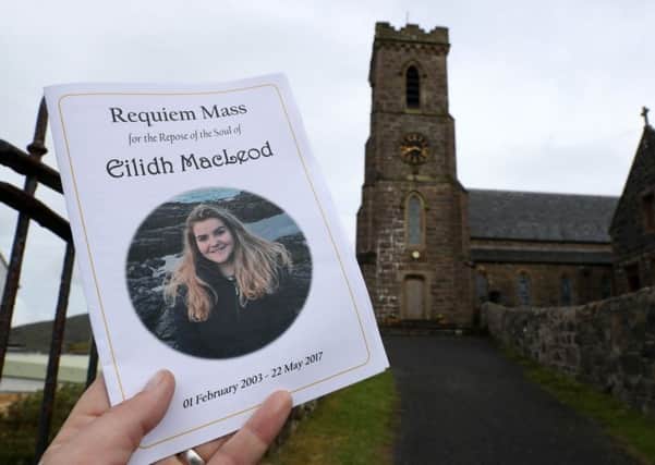 Eilidh's order of service outside the Church of Our Lady, Star of the Sea, in Castlebay.
