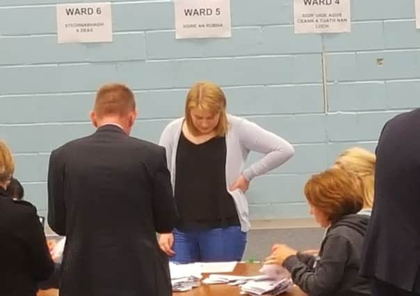There were tense faces during the early part of the count.