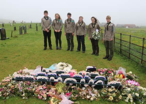The six Venture Scouts lay a wreath in honour of Eilidh MacLeod.