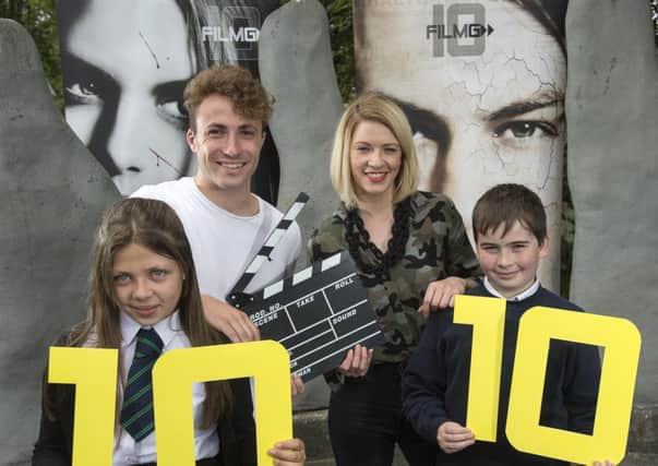 Fiona MacKenzie, the face of BBC ALBA, and journalist and footballer Calum Ferguson were on hand with pupils Anna MacLennan and Ruaraidh Alexander from Gairloch High School to launch the tenth FilmG competition. 
Picture by Trevor Martin.
