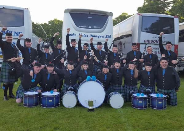 A group shot of Lewis Pipe Band after they became European Champions.