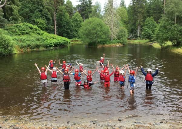 The Harris Guides stayed dry on the raft they built at Regional Camp, until they decided to leap off!