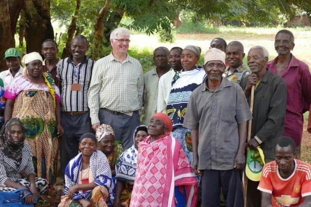 Alasdair with a group of villagers in Mahenge