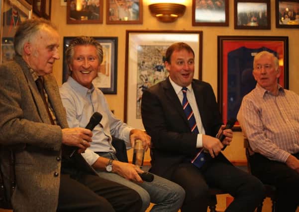 Ronnie McKinnon on stage next to Derek Parlane, Alasdair Morrison of the Lewis and Harris Supporters Club and John Greig.