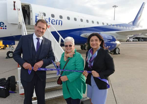 Pictured are Flybe CEO Christine Ourmieres-Widener and Eastern Airways COO Tony Burgess with Marian Macintyre who was the first person to book a ticket on the new Stornoway to Aberdeen route