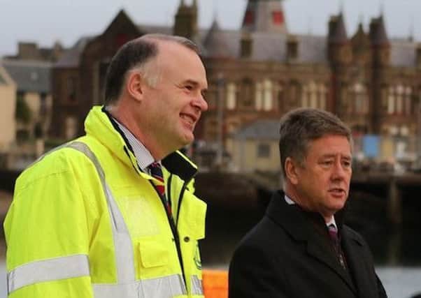 Alex MacLeod, Stornoway Port Authority Chief Executive with Economy Secretary Keith Brown in Stornoway.