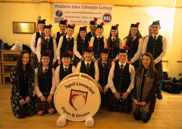 Sgoil Lionacleit Pipe Band get ready for Tartan Week in the Big Apple.