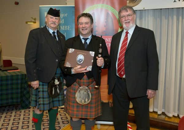 The winner was Angus MacColl with Rod Macleod from Calgary (left) and Kenny Dan Macdonald, one of the directors of Point and Sandwick Trust.