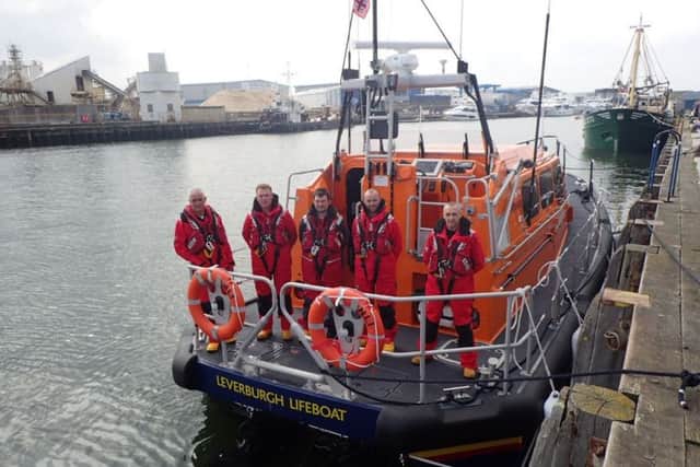 The new lifeboat with the Leverburgh crew gets ready to leave Poole Harbour.