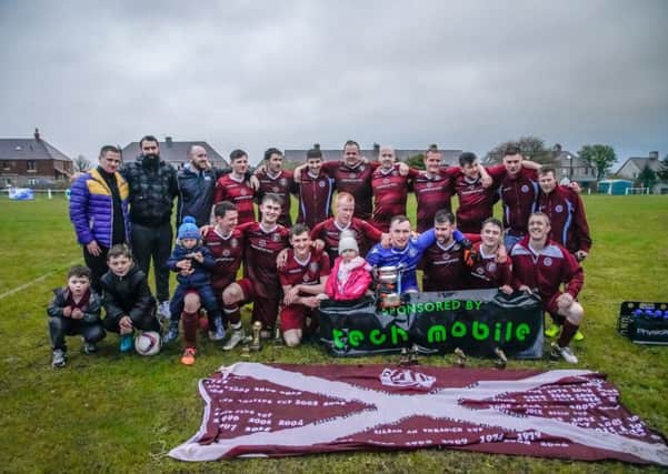 Lochs party on the park with the ABC Cup. (pic by Iain Macdonald)
