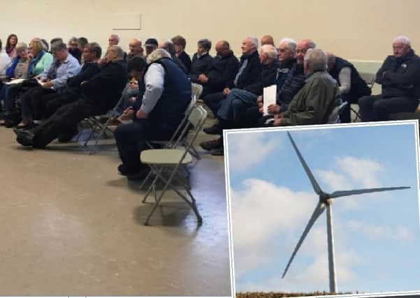 The public meeting was one of the busiest seen in recent years, as fears grow that a split is developing in this community over the wind energy proposal.
