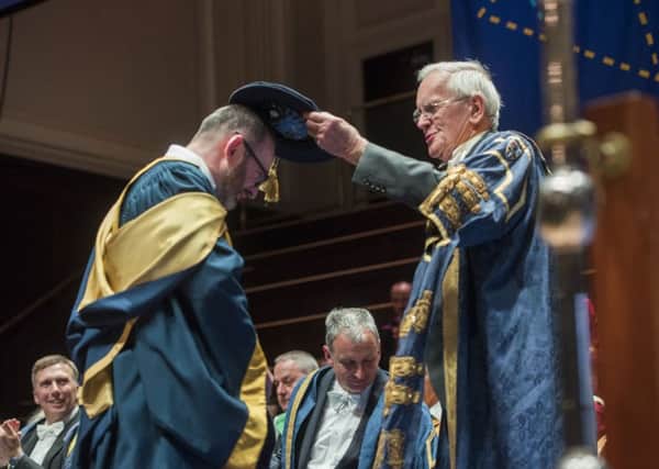 University chancellor Lord Cullen confers an Honorary Doctorate in Education on Craig Mathieson.