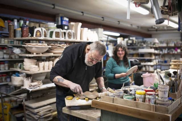 Stella and Alan in the workshop creating the various items on sale at the Coll Pottery Craft Centre.