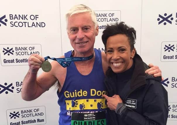 Charles with Dame Kelly Holmes after finishing the Great Scottish Run.