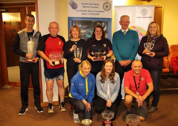 The group of winners at the event on the night, with Kenneth Ovens the chairperson of the Scottish Association  of Local Sports Councils, who presented the prizes.