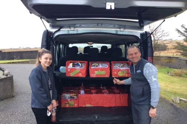 Co-op staff help out with the delivery of food parcels to those group members who were housebound.