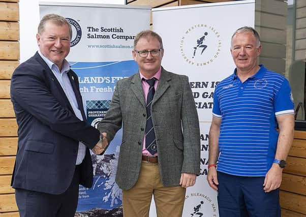 Craig Anderson Chief Executive of SSC with Norrie Macdonald Chairman of Western Isles Island Games Association (WIIGA) and Iain GG Campbell, General Team Manager of the Western Isles Island Games Association (WIIGA).