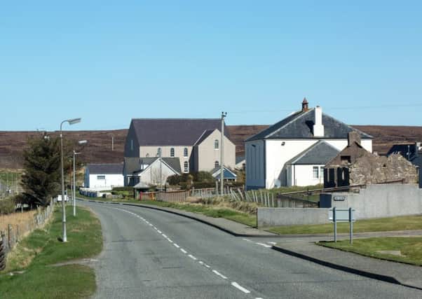 The Garrabost village, with the Memorial Garden visible between the churches. 
Picture by Sandie Maciver of SandiePhotos