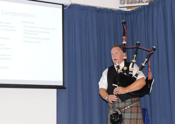 Roddy Macleod, Director of the National Piping Centre and technical adviser on the book, playing a piobaireachd at the launch.