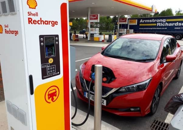The Nissan Leaf being charged up at a Shell petrol station on its trip down south. The cost for the trip was £34.75 for a 1,217 mile journey.