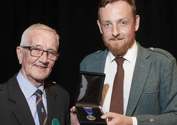 James Mackenzie with Pipe Major Iain Murdo Morrison.  Picture courtesy of the Northern Meeting organising committee.