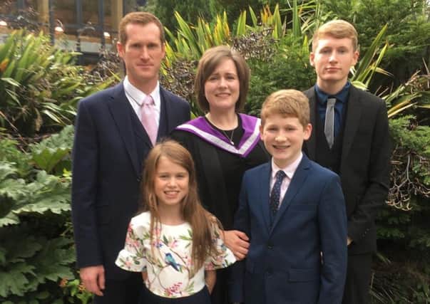 Shona is pictured with her husband David;  sons Lennon and Anthony and daughter Mairi.  Shona graduated with a Post Graduate Diploma in Education in August. She is now teaching at Sgoil an Iochdair.