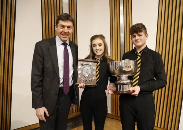 The winners of the 2018 competition were Hannah Macleod and Sandy Morrison from the Nicolson Institute, alongside Presiding Officer of the Scottish Parliament, Rt. Hon Ken Macintosh MSP.