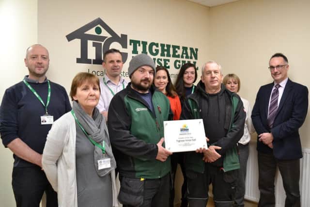 The TIG insulation team with Iain Watson, Housing Services Manager at Comhairle nan Eilean Siar.