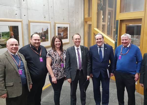 Pictured at the meeting are: Councillor Donald Manford, Brian Currie, Theresa Irving, Alasdair Allan MSP, Paul Wheelhouse MSP and Donald Joseph Maclean.