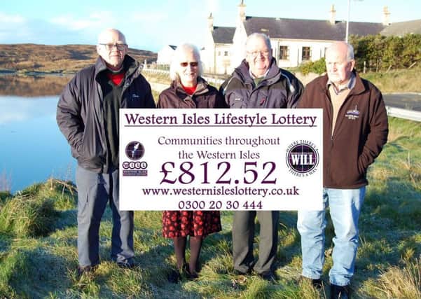 The Harris Historical Society group receive a much needed boost from the local lottery to help them achieve their aims.