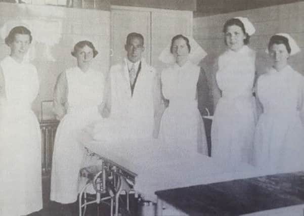 Jean spent some time as a theatre nurse in Glasgow. In this image she is pictured second from the left with her team.